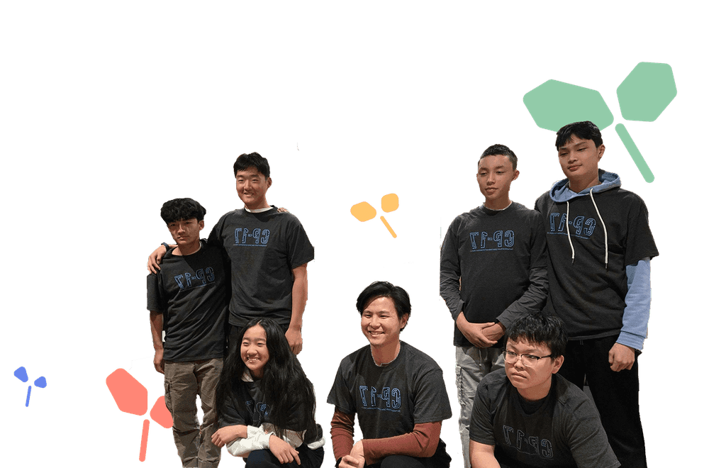 Learning Lab students and their coach in matching team shirts