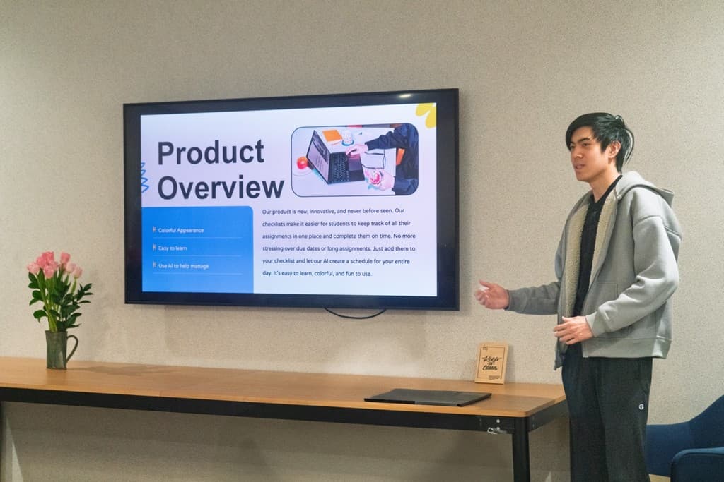 A student presenting a product overview to an audience